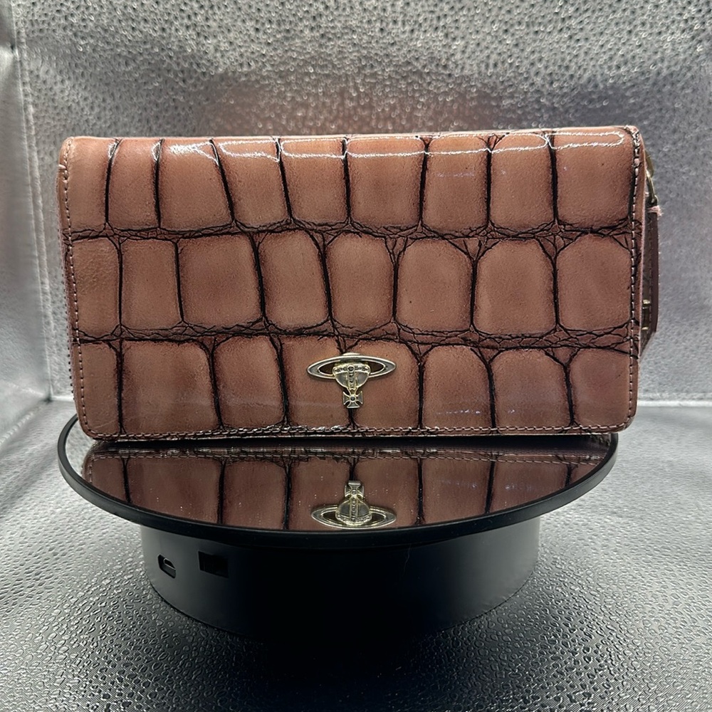 Gorgeous Vivienne Westwood wallet in a crocodile pattern.